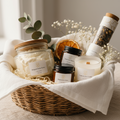 Basket of candles and small bottles on a light surface with a neutral background